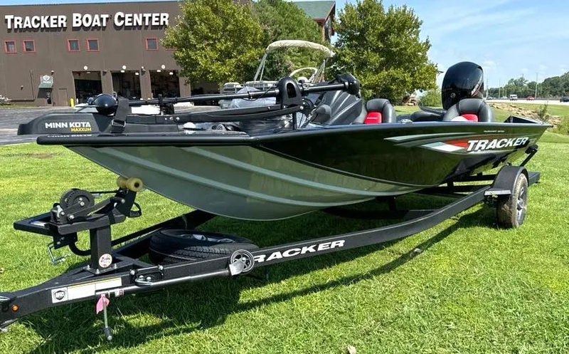 Slide: The Image of 2025 Tracker Pro Team 195 Tournament Edition boat on trailer at Tracker Boat Center. - 2