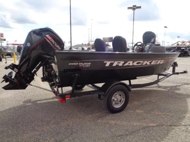 Slide: The Image of 2025 Tracker Pro Guide V-16 SC boat with Mercury engine on trailer. - 5