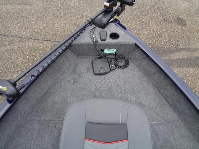 Slide: The Image of 2025 Tracker Pro Guide V-16 SC boat interior with trolling motor and seat. - 6