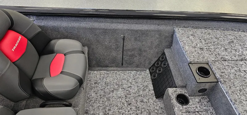 Slide: The Image of 2025 Tracker Pro Team 195 Tournament Edition boat interior with seating and storage. - 13