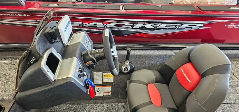 Slide: The Image of 2025 Tracker Pro Team 195 Tournament Edition boat interior with steering console and seat. - 4