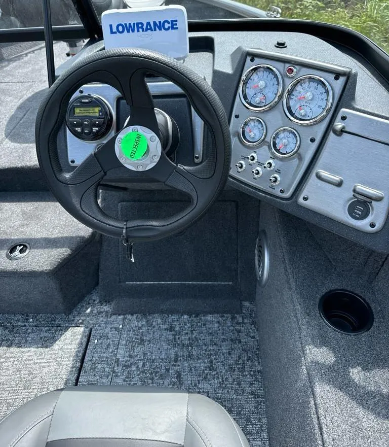 Slide: The Image of 2025 Tracker Pro Guide V-175 Combo boat dashboard with Lowrance electronics. - 8