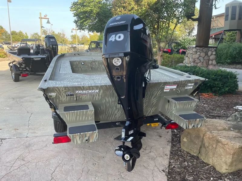 Slide: The Image of 2025 Tracker Grizzly 1654 T Sportsman boat with Mercury 40 outboard motor. - 3