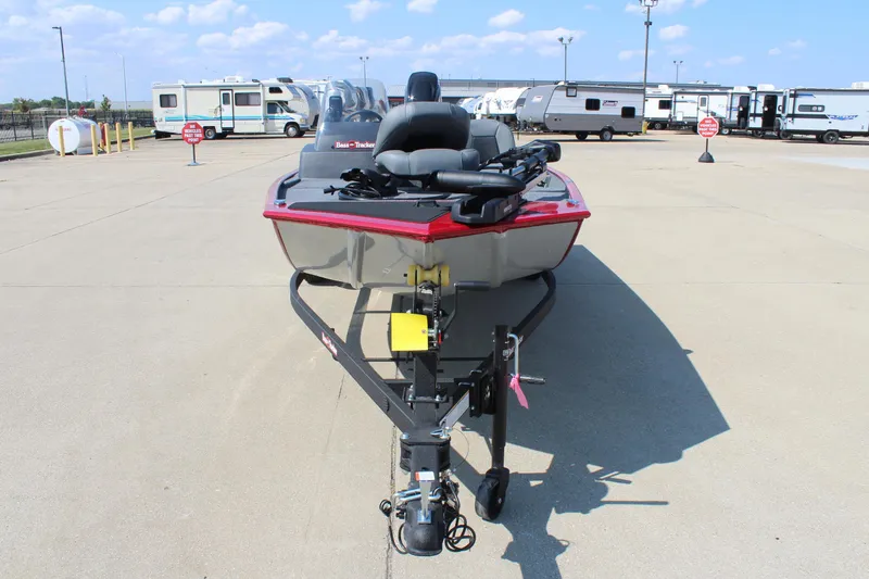 Slide: The Image of 2025 Tracker Bass Tracker Classic XL boat on trailer in parking lot. - 2