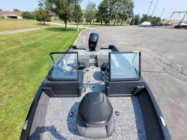 Slide: The Image of 2025 Tracker Pro Guide V-175 Combo boat with dual consoles and spacious seating. - 4