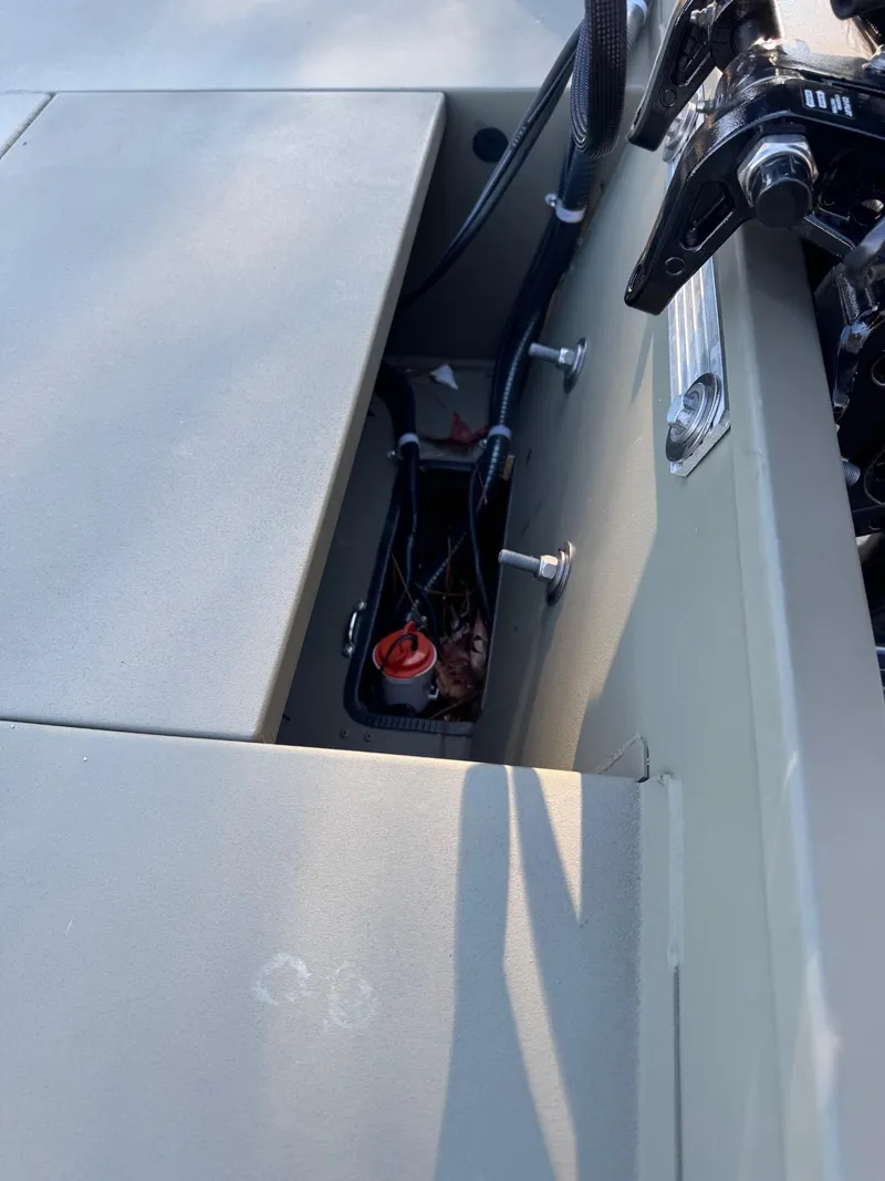 Slide: The Image of 2025 Tracker Grizzly 1654 T Sportsman boat interior wiring detail. - 46