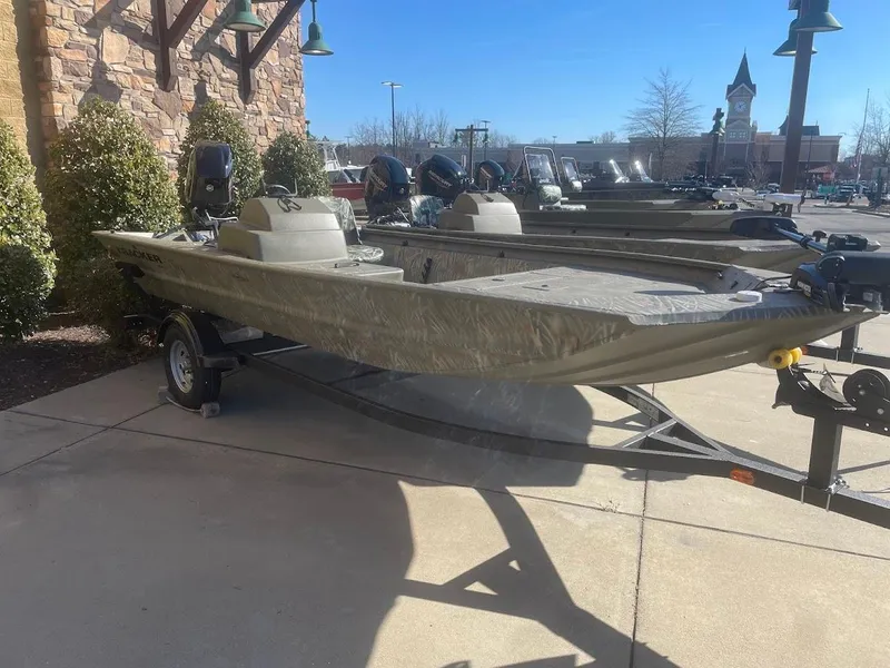 The Image of 2025 Tracker Grizzly 1754 SC boat on trailer, outdoor display, sunny day. - 0