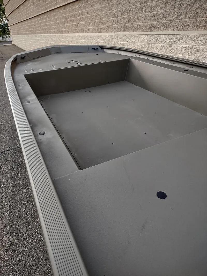 Slide: The Image of 2025 Tracker Grizzly 1754 Jon boat, spacious interior, sturdy design. - 6