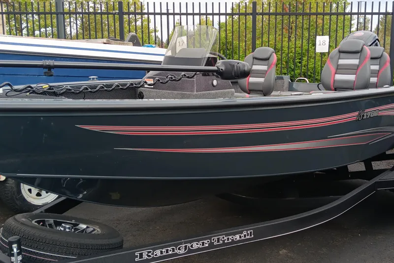 The Image of 2024 Ranger VS1782SC Angler boat with sleek black design and red accents. - 0