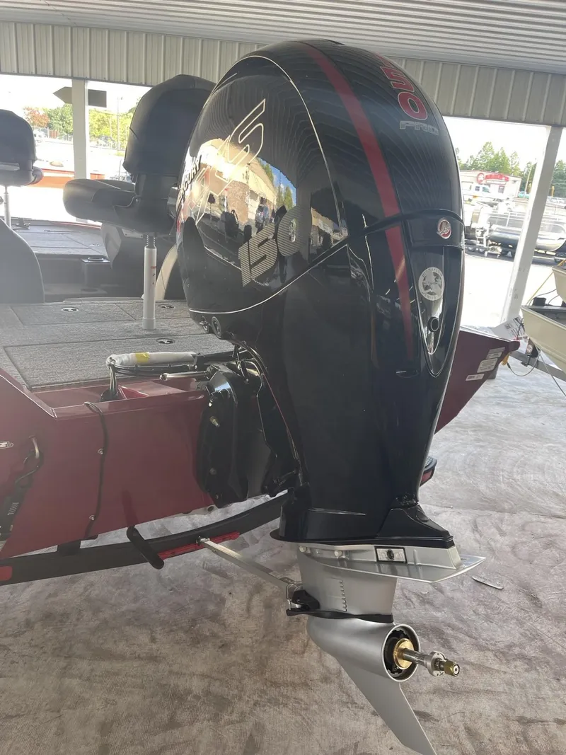 Slide: The Image of 2025 Tracker Pro Team 195 Tournament Edition boat with powerful outboard motor. - 2