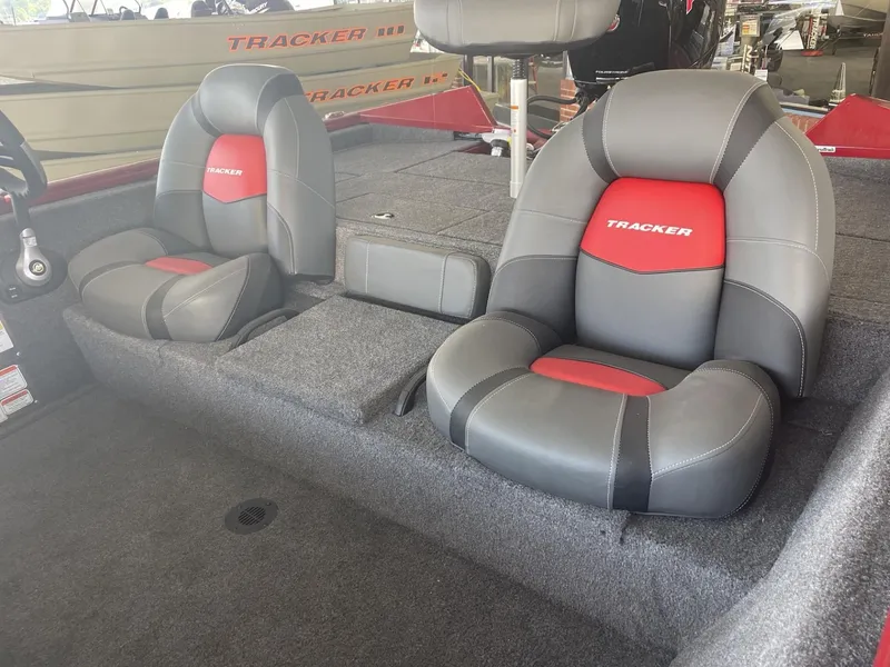 Slide: The Image of 2025 Tracker Pro Team 195 Tournament Edition boat seats, gray and red upholstery. - 5