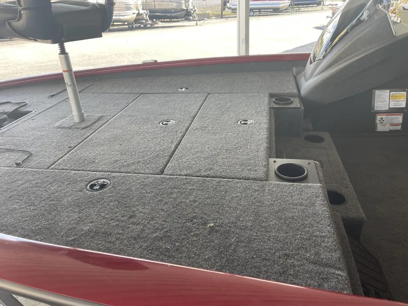 Slide: The Image of 2025 Tracker Pro Team 195 Tournament Edition boat deck with storage compartments. - 6