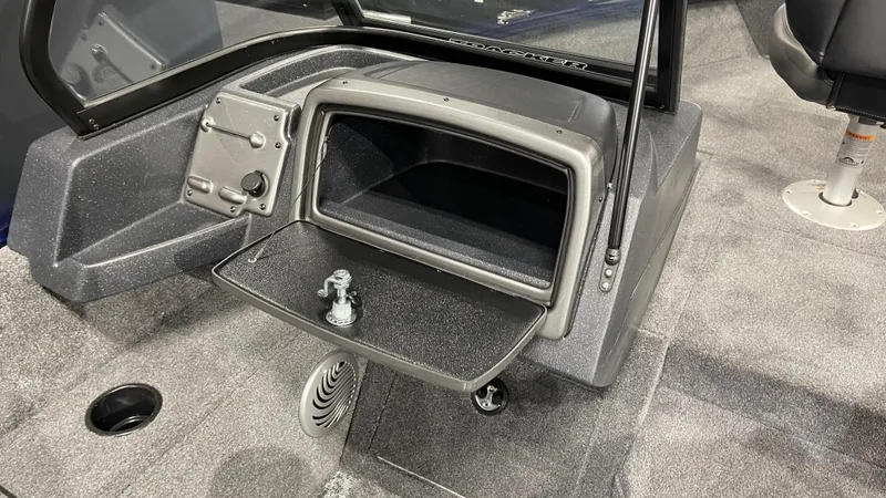 Slide: The Image of 2025 Tracker Pro Guide V-175 Combo boat interior with storage compartment open. - 14