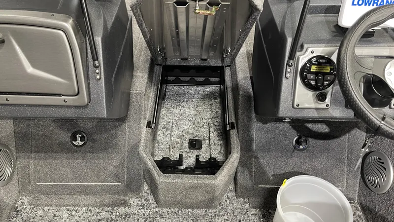 Slide: The Image of Interior of 2025 Tracker Pro Guide V-175 Combo boat with steering wheel and storage compartments. - 15