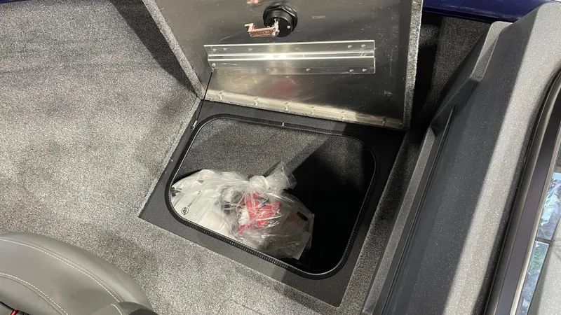 Slide: The Image of Storage compartment in 2025 Tracker Pro Guide V-175 Combo boat interior. - 17