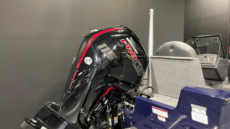 Slide: The Image of 2025 Tracker Pro Guide V-175 Combo boat with powerful motor, sleek design. - 4