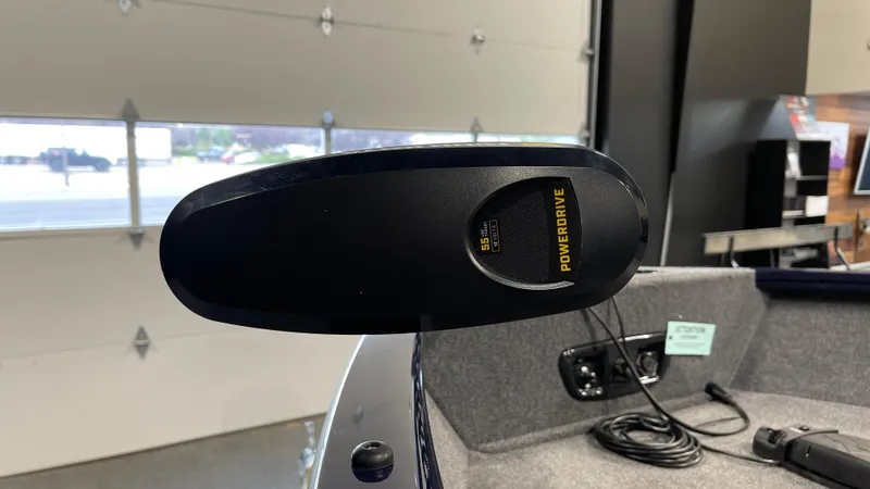 Slide: The Image of 2025 Tracker Pro Guide V-175 Combo boat with PowerDrive trolling motor in a garage. - 6