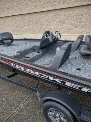 Slide: The Image of 2025 Tracker Pro Team 195 Tournament Edition boat, gray interior, sleek design. - 4
