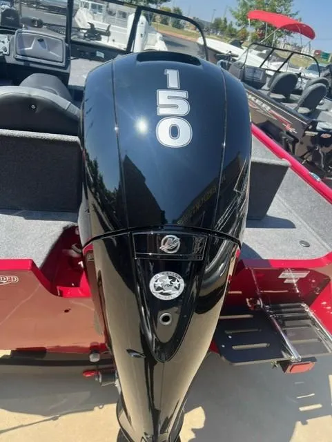 Slide: The Image of 2025 Tracker Pro Guide V-175 Combo boat with 150 HP engine, rear view. - 4