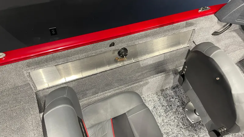 Slide: The Image of Interior of 2025 Tracker Pro Guide V-16 WT boat with seating and storage. - 16