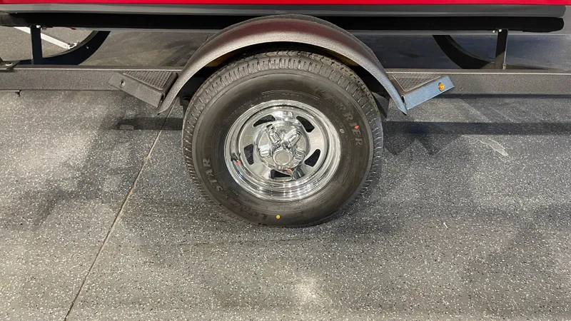 Slide: The Image of Trailer wheel of 2025 Tracker Pro Guide V-16 WT boat. - 7