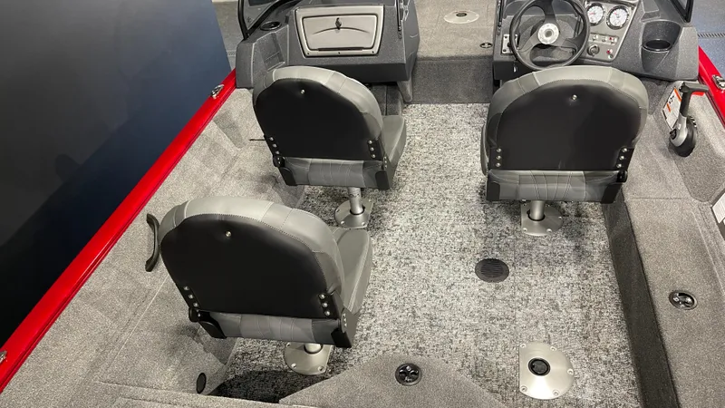 Slide: The Image of 2025 Tracker Pro Guide V-16 WT interior with three seats and dashboard. - 9