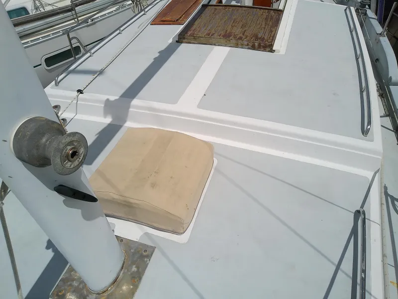Slide: The Image of 1978 Downeast 38 sailboat deck with winch and hatch. - 14