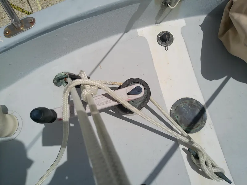Slide: The Image of Close-up of 1978 Downeast 38 sailboat deck with ropes and fittings. - 19