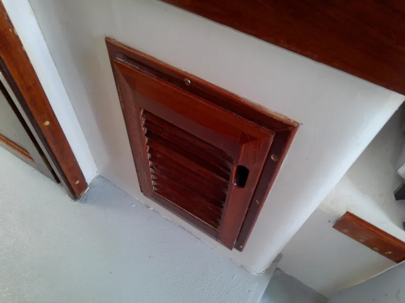 Slide: The Image of Wooden vent on 1978 Downeast 38 boat interior. - 42