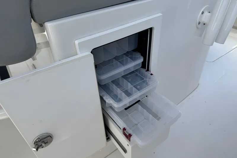 Slide: The Image of Garmin marine radio on 2022 Regulator 31 boat dashboard. - 23