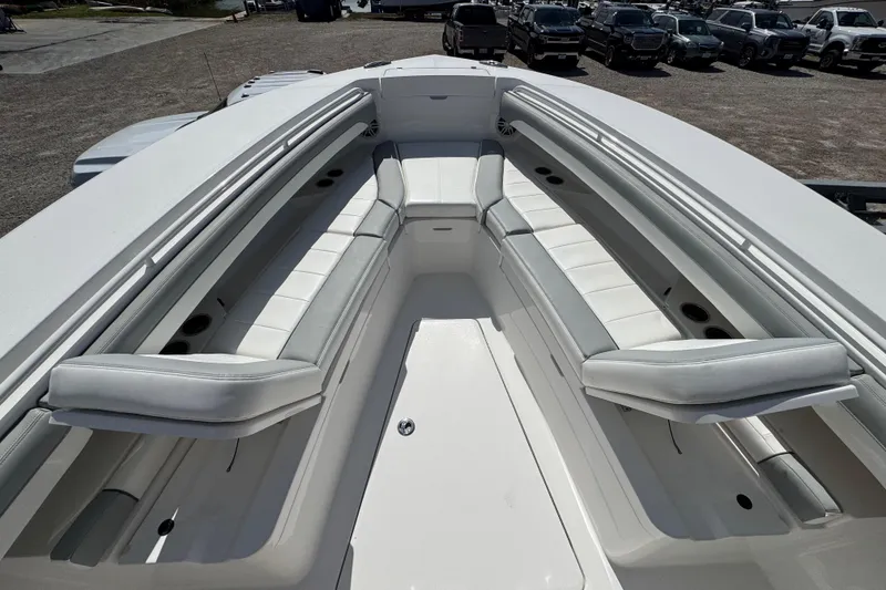 Slide: The Image of 2022 Regulator 31 boat on stands outside a marina garage. - 5