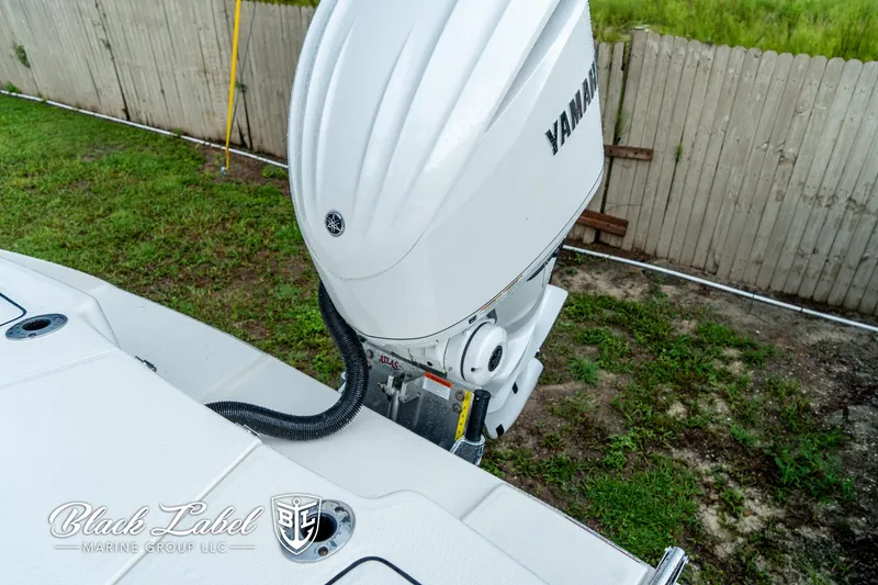 Slide: The Image of 2025 Pathfinder Open 2400 boat with Yamaha outboard motor, viewed from above. - 21