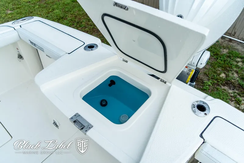Slide: The Image of Open storage compartment on 2025 Pathfinder Open 2400 boat by Black Label Marine Group. - 7