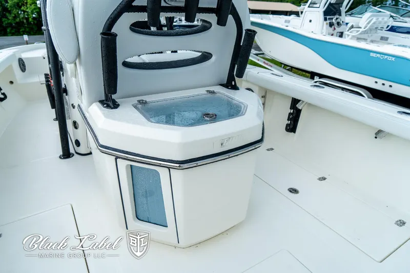 Slide: The Image of 2025 Pathfinder Open 2400 boat interior with seating and storage compartment. - 8