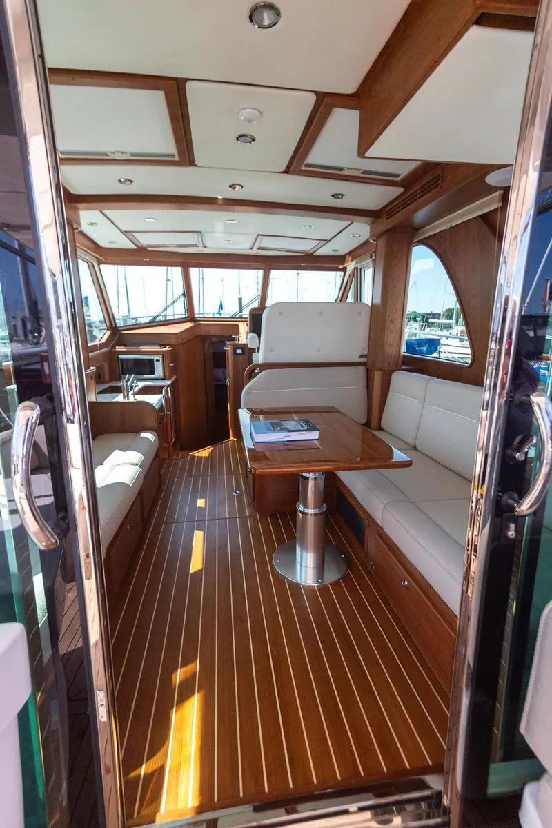 Slide: The Image of Luxurious interior of 2025 Sabre 43 Salon Express yacht with elegant wood finishes. - 20