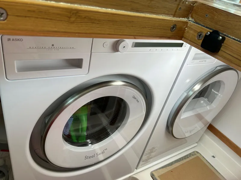 Slide: The Image of Laundry appliances in 2025 Sabre 43 Salon Express yacht interior. - 38