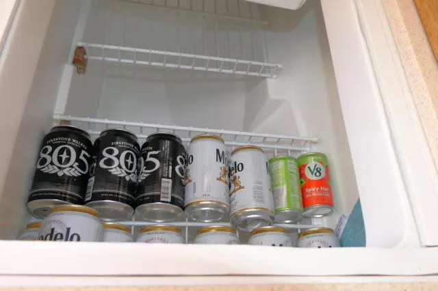 Slide: The Image of Cans of beer and V8 juice in a Catalina 36 Mk II fridge. - 12