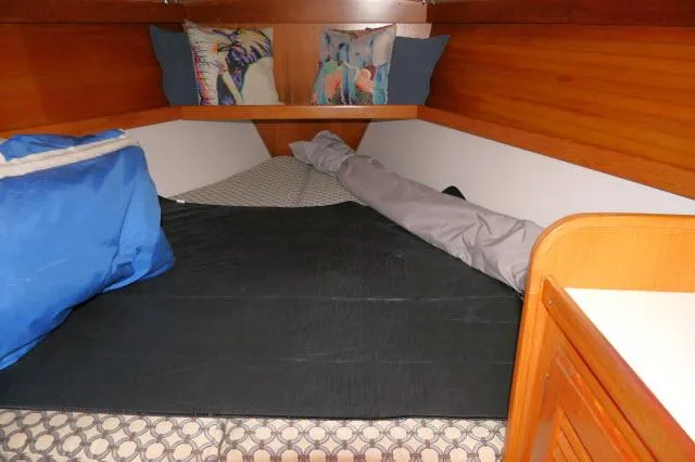 Slide: The Image of Cozy cabin interior of 1995 Catalina 36 Mk II sailboat with bedding and pillows. - 17