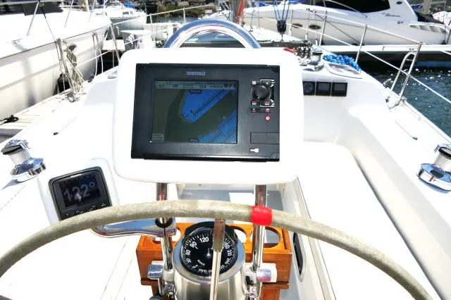Slide: The Image of Catalina 36 Mk II 1995 yacht cockpit with navigation system and compass. - 26