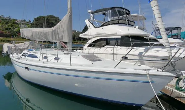 Slide: The Image of 1995 Catalina 36 Mk II sailboat docked in marina, side view. - 40