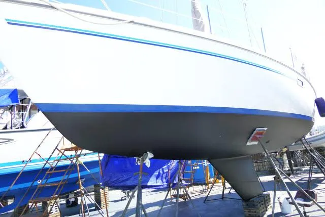 Slide: The Image of 1995 Catalina 36 Mk II sailboat on dry dock, hull view. - 42