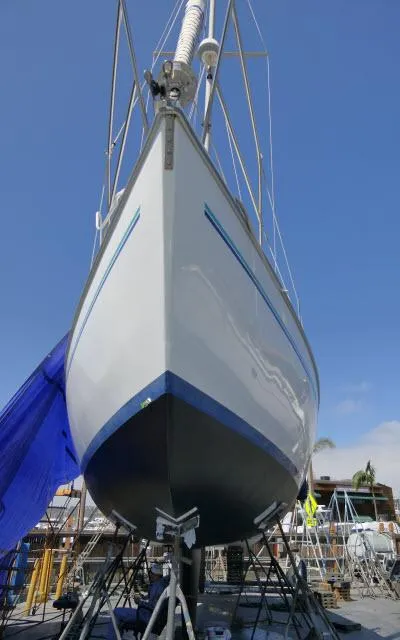 Slide: The Image of 1995 Catalina 36 Mk II sailboat on dry dock, viewed from the bow. - 43