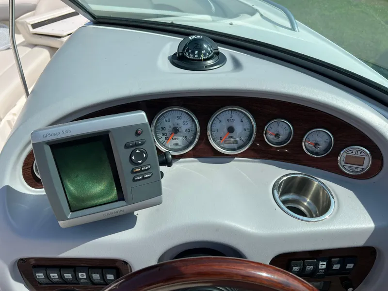 Slide: The Image of Dashboard of 2007 Chaparral 220 SSi boat with gauges and GPS system. - 17