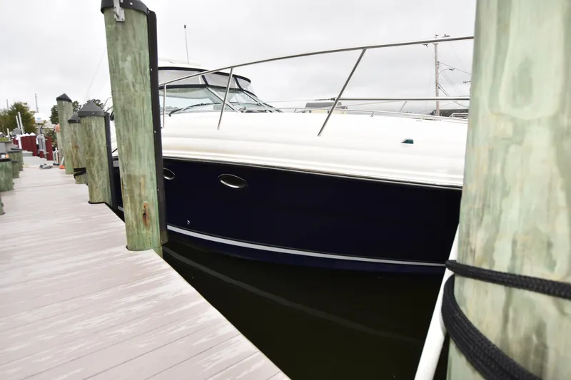Slide: The Image of 2005 Sea Ray 420 Sundancer yacht docked at marina. - 38