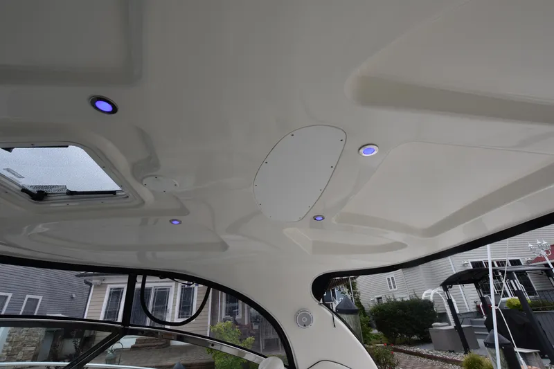 Slide: The Image of Interior view of 2005 Sea Ray 420 Sundancer boat with modern lighting and sleek design. - 44