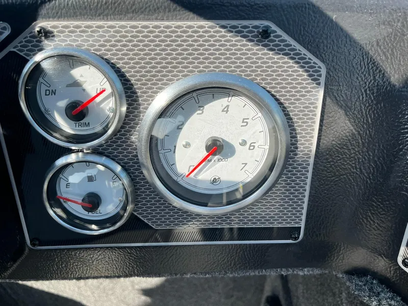 Slide: The Image of Dashboard gauges of 2025 Lund 2075 Impact XS Sport boat. - 23