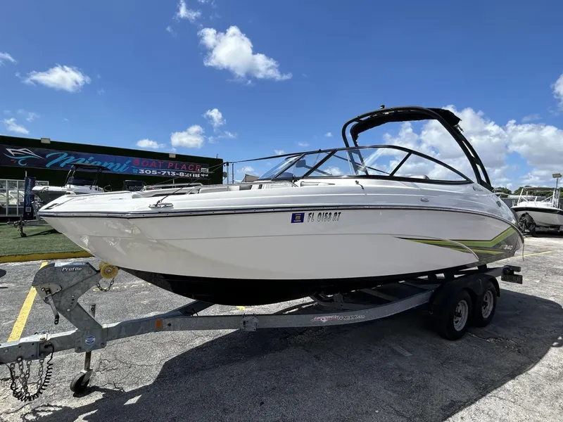 Slide: The Image of 2019 Yamaha AR240 boat on trailer under clear blue sky. - 12