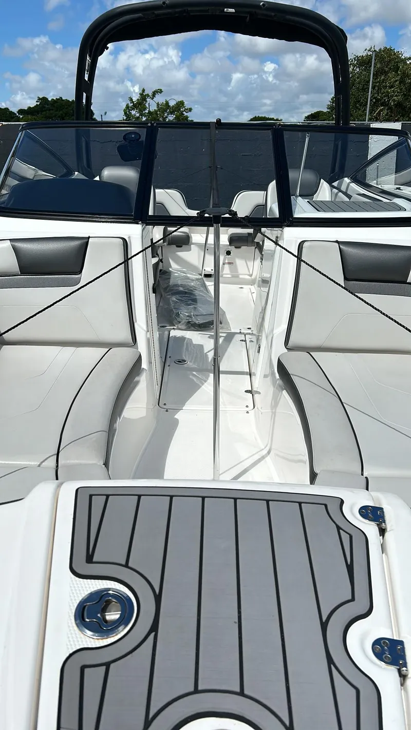 Slide: The Image of 2019 Yamaha Boats AR240 interior with sleek seating and modern design. - 14