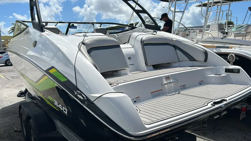 Slide: The Image of 2019 Yamaha AR240 boat with sleek design and spacious deck. - 15