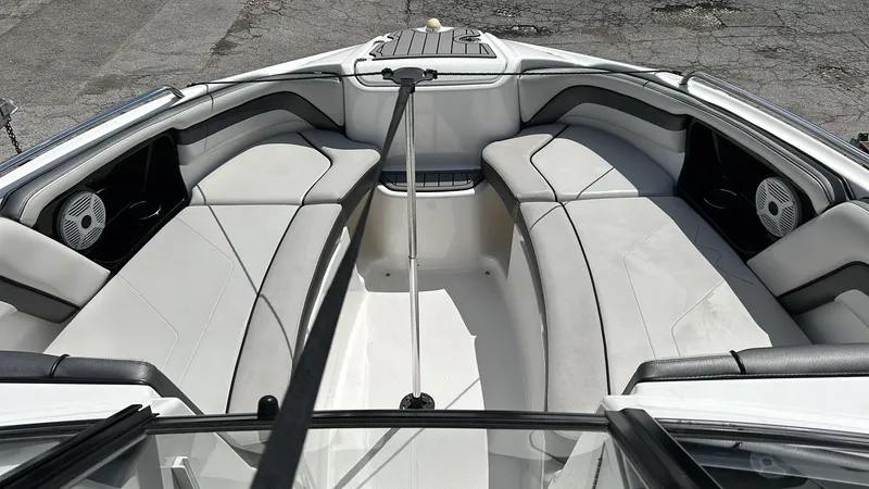 Slide: The Image of 2019 Yamaha Boats AR240 interior with spacious seating and sleek design. - 16
